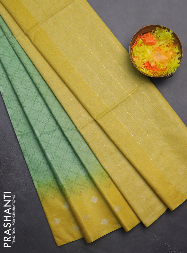 Semi bamboo saree green shade and yellow with allover thread weaves and sequin work pallu