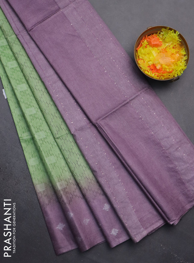 Semi bamboo saree pastel green and mild purple with allover thread weaves and sequin work pallu