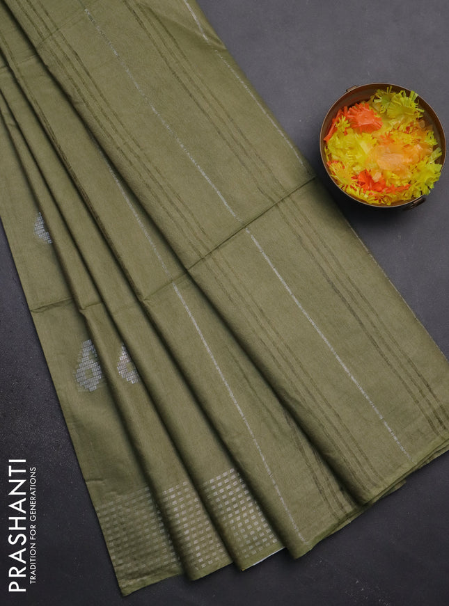 Semi bamboo saree green shade with silver zari woven buttas and silver zari woven border