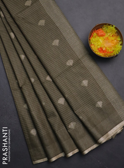Semi bamboo saree military green with allover thread weaves & zari buttas and zari woven piping border