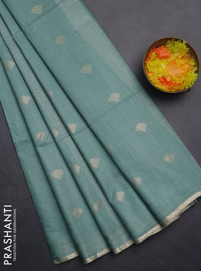 Semi bamboo saree pastel green with allover thread weaves & zari buttas and zari woven piping border