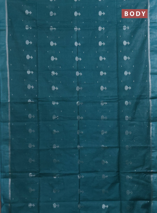 Semi bamboo saree teal green shade with silver zari woven buttas and zari woven simple border