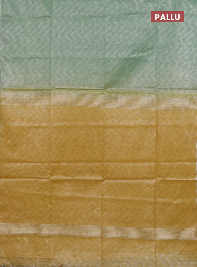 Semi bamboo tissue saree pastel green and yellow with allover silver zari weaves and zari woven piping border