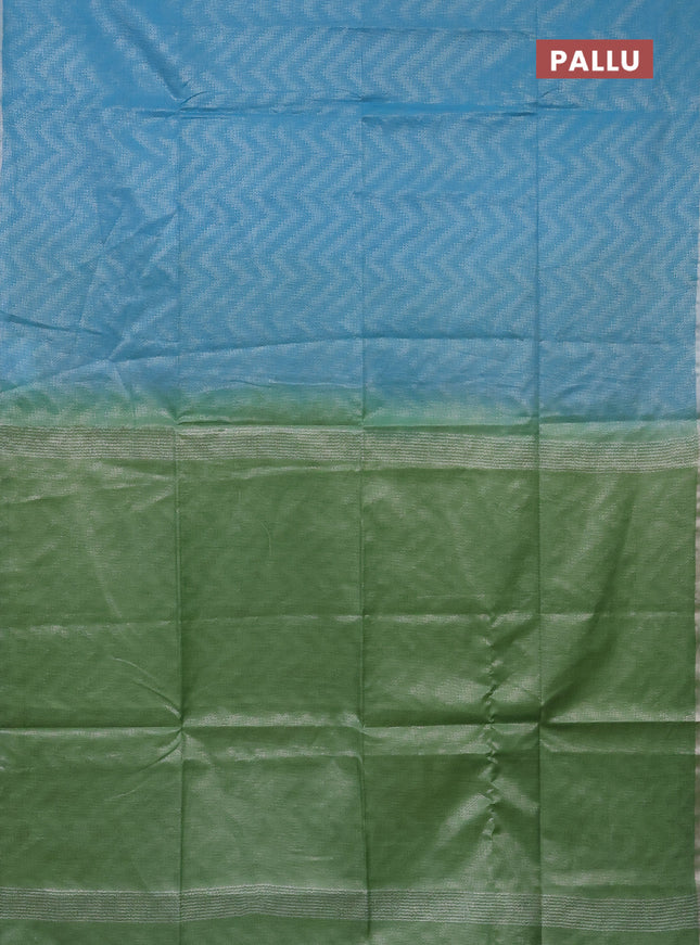 Semi bamboo tissue saree light blue and pastel green with allover silver zari weaves and zari woven piping border