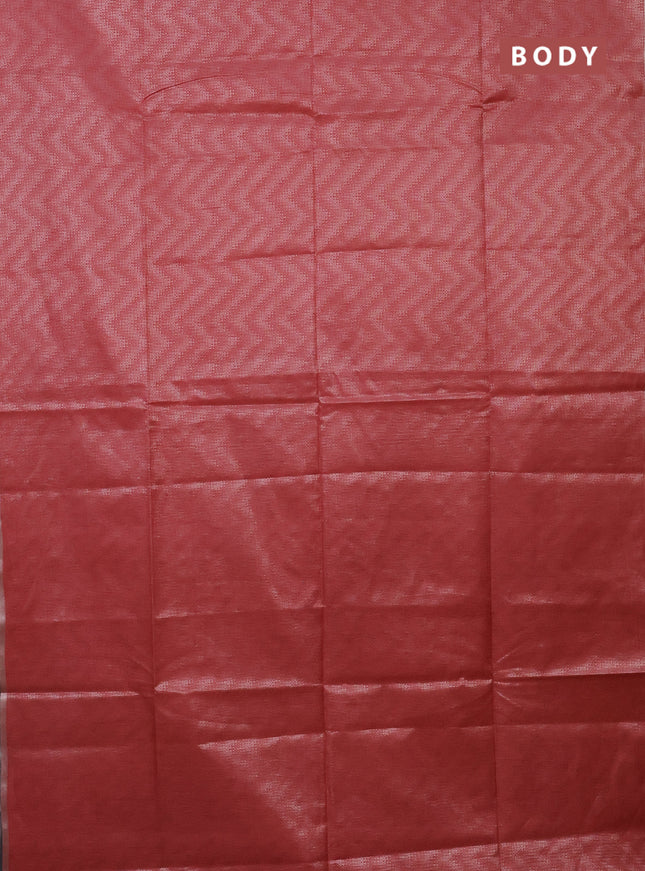 Semi bamboo tissue saree peach shade and grey with allover silver zari weaves and zari woven piping border