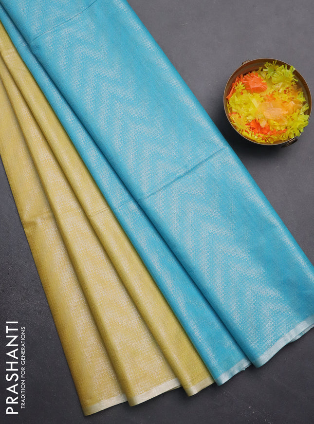 Semi bamboo tissue saree lime yellow and light blue with allover silver zari weaves and zari woven piping border