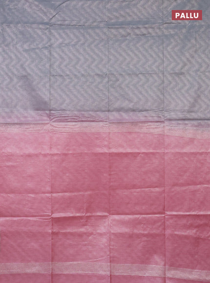 Semi bamboo tissue saree grey and peach pink with allover silver zari weaves and zari woven piping border