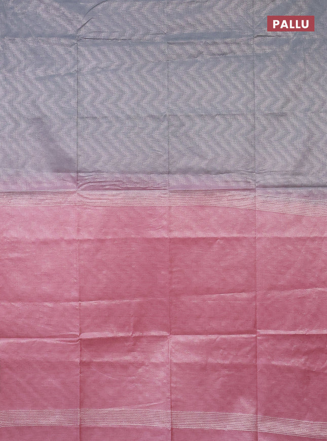 Semi bamboo tissue saree grey and peach pink with allover silver zari weaves and zari woven piping border