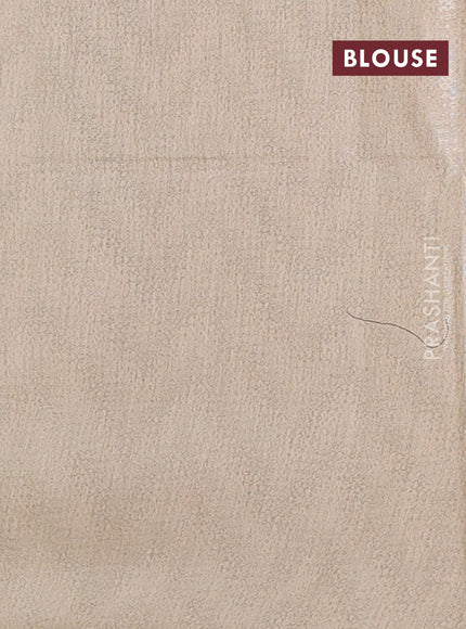 Semi bamboo tissue saree pastel pink and beige with allover silver zari weaves and zari woven piping border