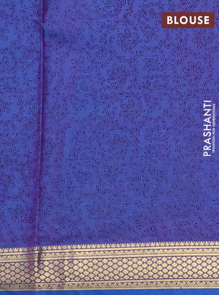 Printed silk saree dual shade of bluish purple with allover prints and zari woven border