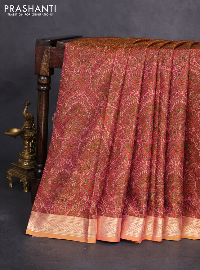 Printed silk saree dual shade of peach orange with allover prints and zari woven border
