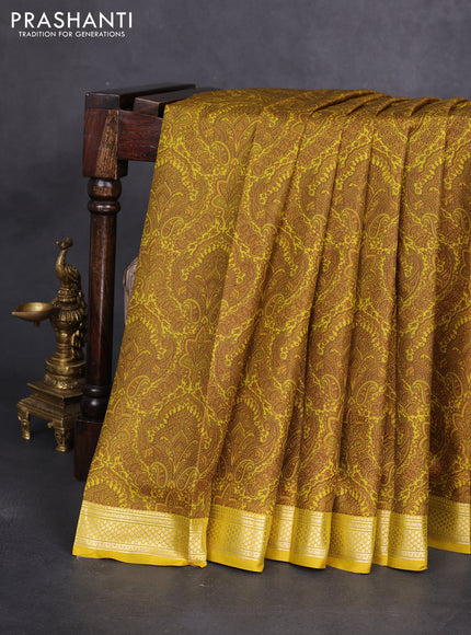 Printed silk saree mustard yellow with allover prints and zari woven border