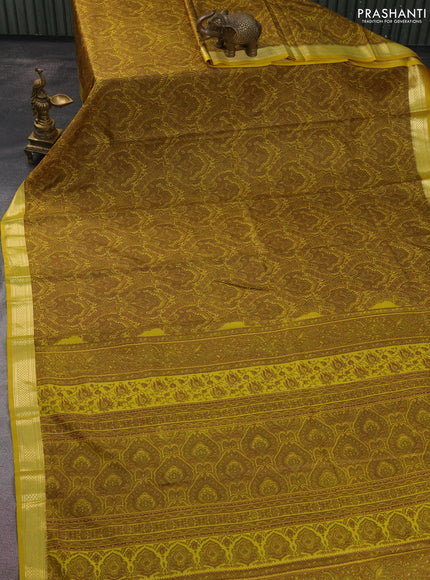 Printed silk saree mustard yellow with allover prints and zari woven border