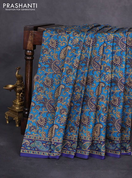 Printed silk saree cs blue and blue with allover prints and printed border