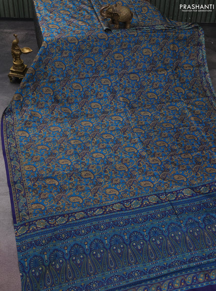 Printed silk saree cs blue and blue with allover prints and printed border