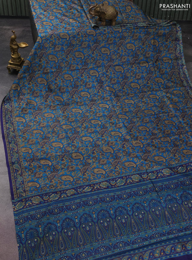 Printed silk saree cs blue and blue with allover prints and printed border