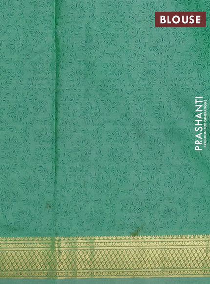 Printed silk saree pastel green with allover prints and zari woven border