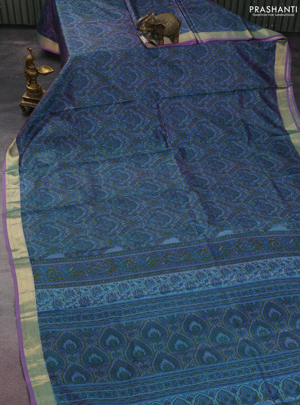 Printed silk saree dual shade of greyish lavender with allover prints and zari woven border