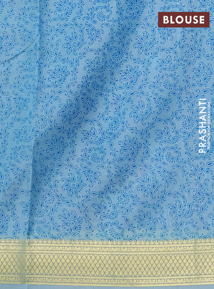 Printed silk saree light blue with allover prints and zari woven border