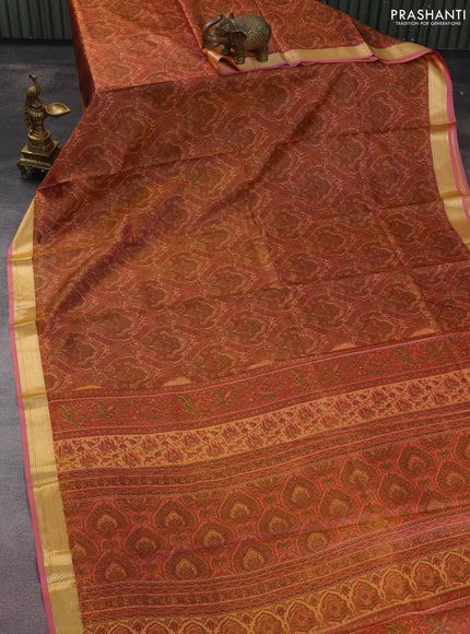 Printed silk saree pastel peach and peach pink with allover prints and zari woven border