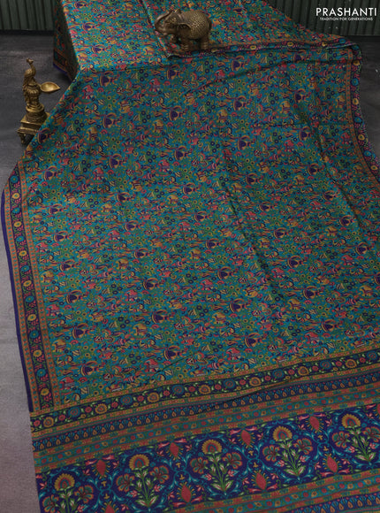 Printed silk saree teal green and blue with allover kalamkari prints and printed border