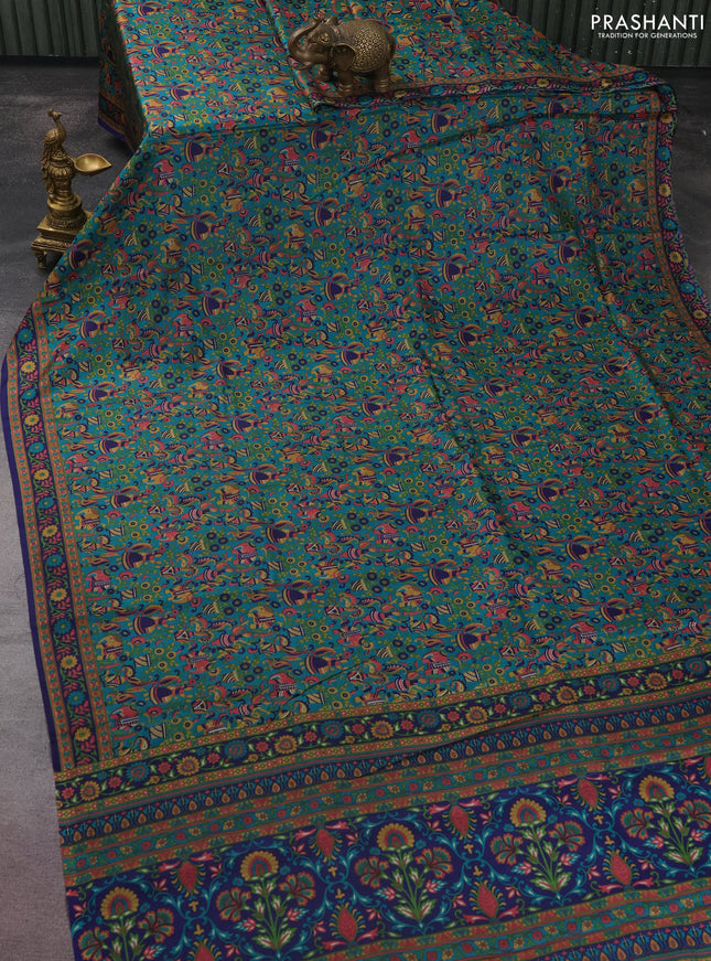Printed silk saree teal green and blue with allover kalamkari prints and printed border