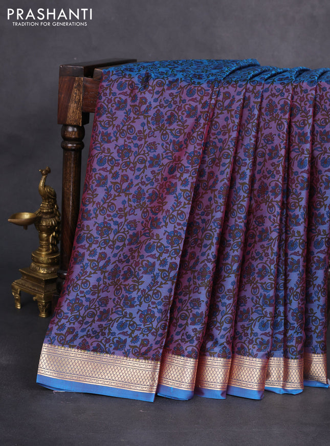 Printed silk saree dual shade of maroonish blue with allover prints and zari woven border