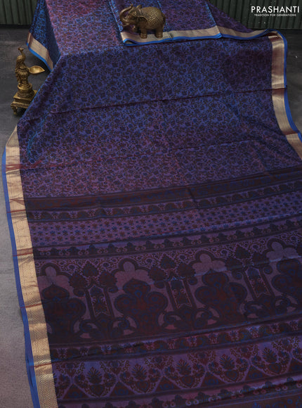 Printed silk saree dual shade of maroonish blue with allover prints and zari woven border