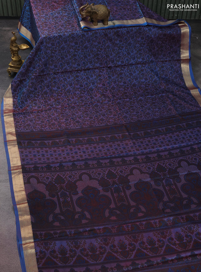 Printed silk saree dual shade of maroonish blue with allover prints and zari woven border