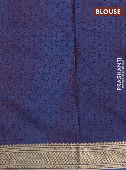 Printed silk saree dual shade of maroonish blue with allover prints and zari woven border