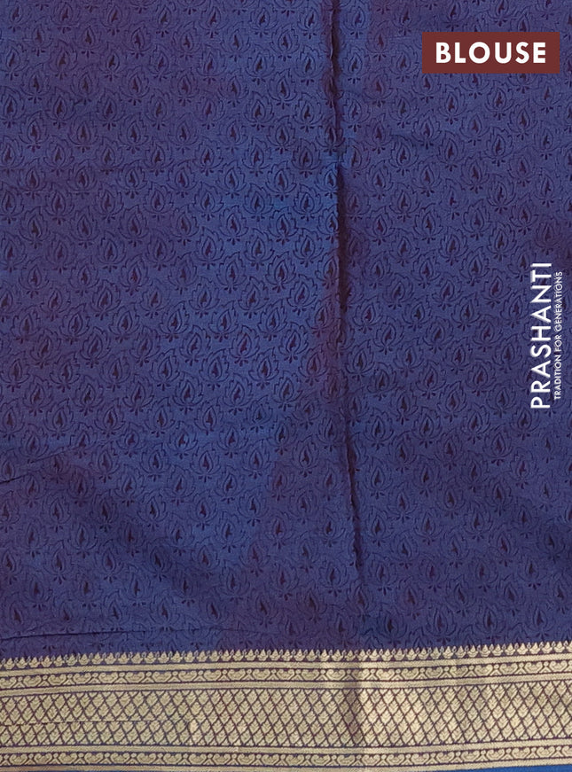 Printed silk saree dual shade of maroonish blue with allover prints and zari woven border