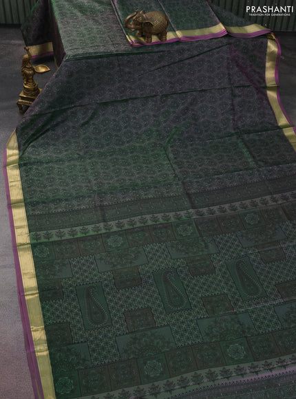 Printed silk saree dual shade of greenish purple with allover prints and zari woven border