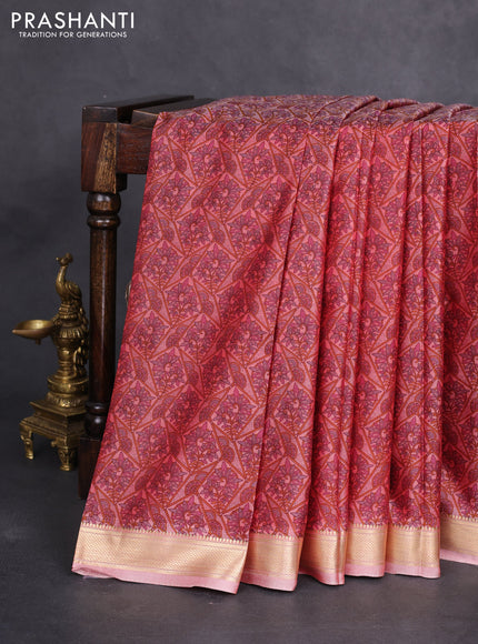 Printed silk saree dual shade of pastel peach with allover prints and zari woven border