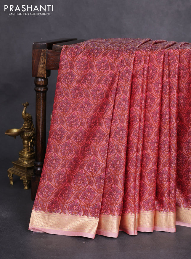 Printed silk saree dual shade of pastel peach with allover prints and zari woven border