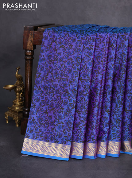 Printed silk saree dual shade of bluish purple with allover prints and zari woven border