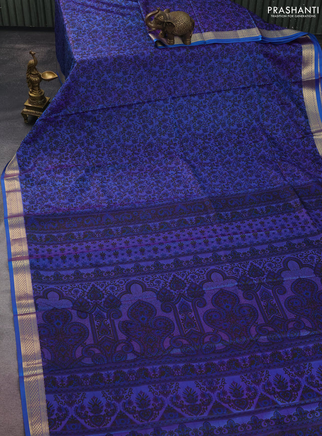 Printed silk saree dual shade of bluish purple with allover prints and zari woven border