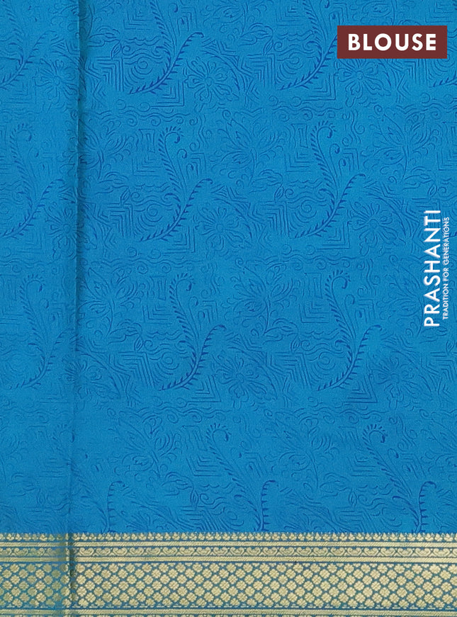 Printed silk saree teal blue with allover prints and zari woven border