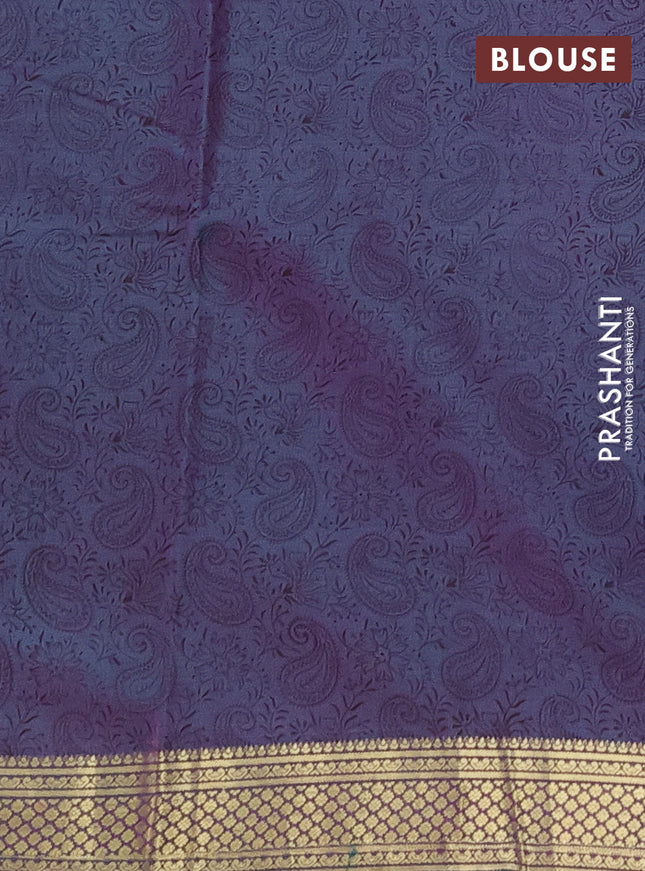 Printed silk saree dual shade of purple and teal green with allover paisley prints and zari woven border