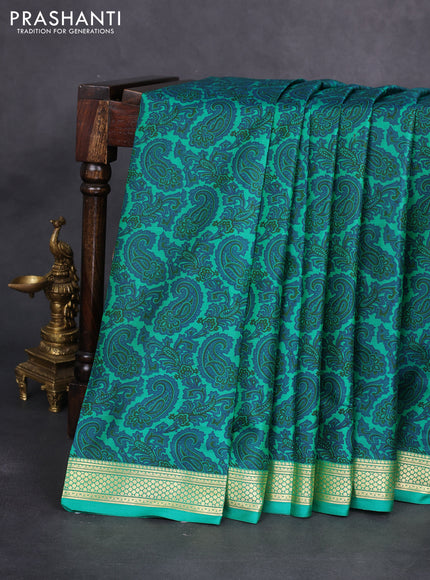 Printed silk saree green with allover paisley prints and zari woven border