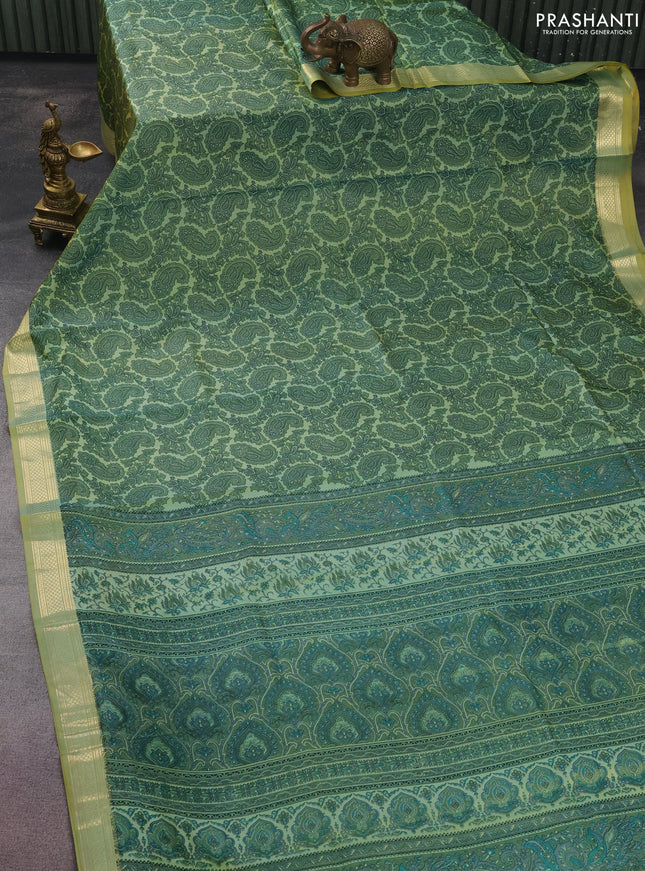 Printed silk saree dual shade of pastel green with allover paisley prints and zari woven border