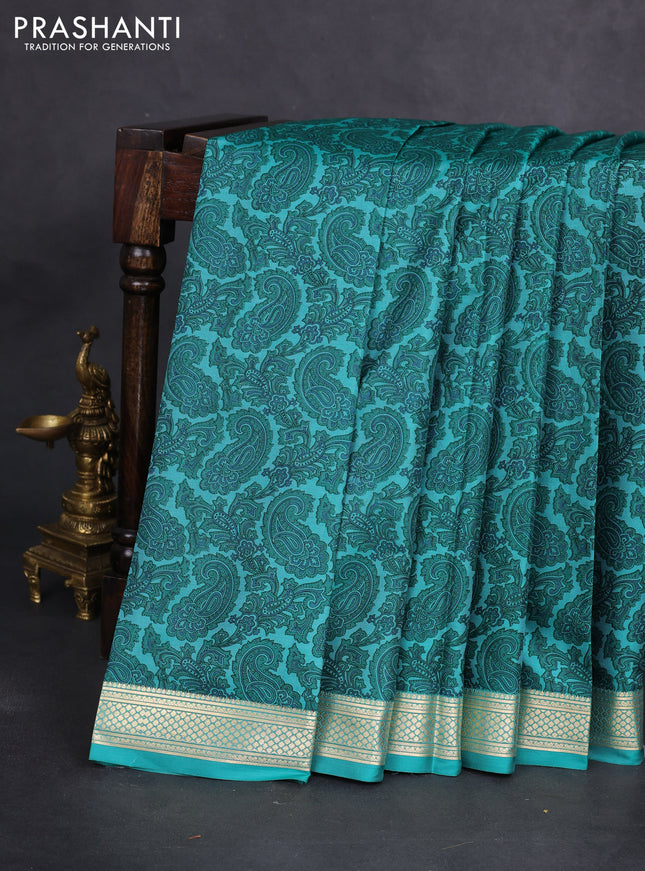 Printed silk saree teal green with allover paisley prints and zari woven border
