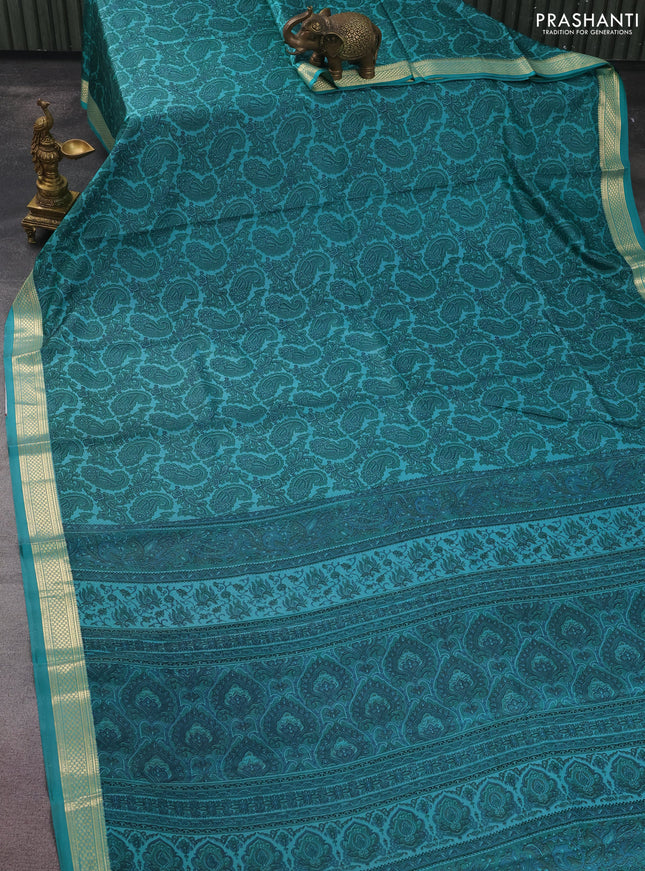 Printed silk saree teal green with allover paisley prints and zari woven border