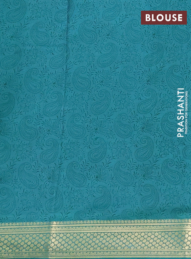 Printed silk saree teal green with allover paisley prints and zari woven border