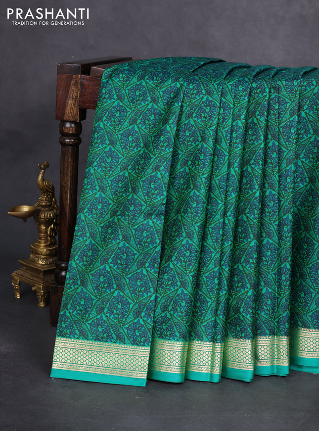 Printed silk saree green with allover prints and zari woven border