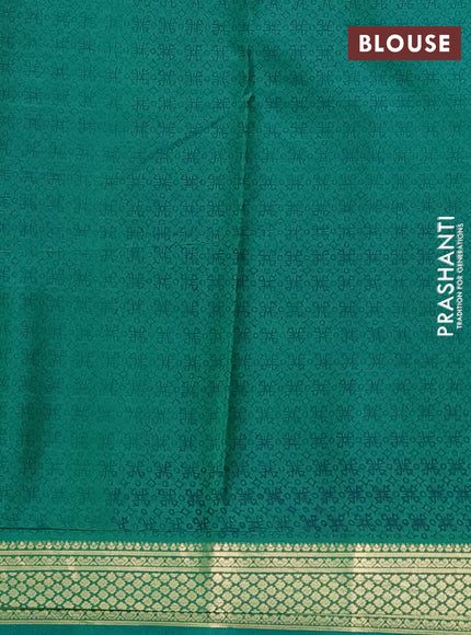 Printed silk saree green with allover prints and zari woven border