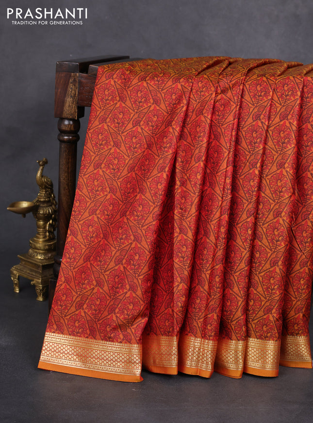 Printed silk saree dark mustard with allover prints and zari woven border