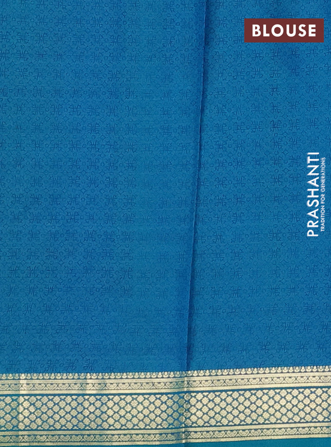 Printed silk saree teal green and blue with allover prints and zari woven border
