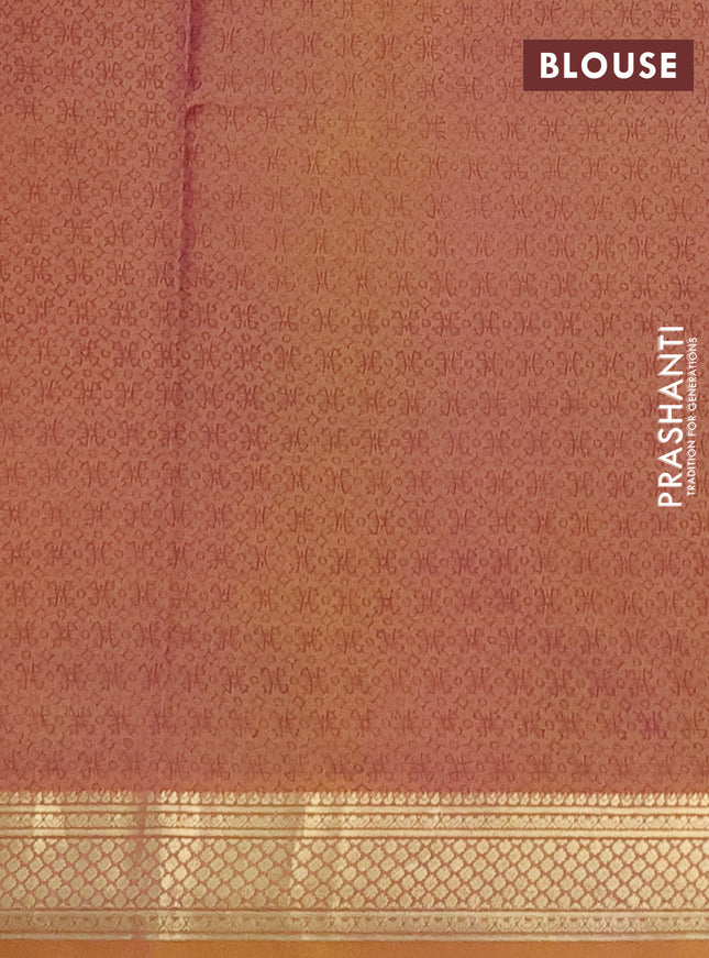 Printed silk saree dual shade of peach orange with allover prints and zari woven border