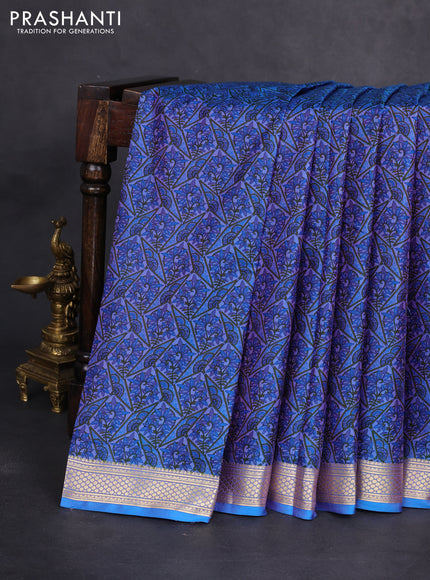 Printed silk saree dual shade of bluish purple with allover prints and zari woven border