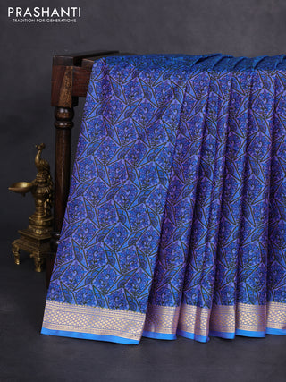 Printed silk saree dual shade of bluish purple with allover prints and zari woven border